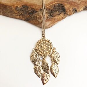 New York & Company gold feather dream catcher necklace